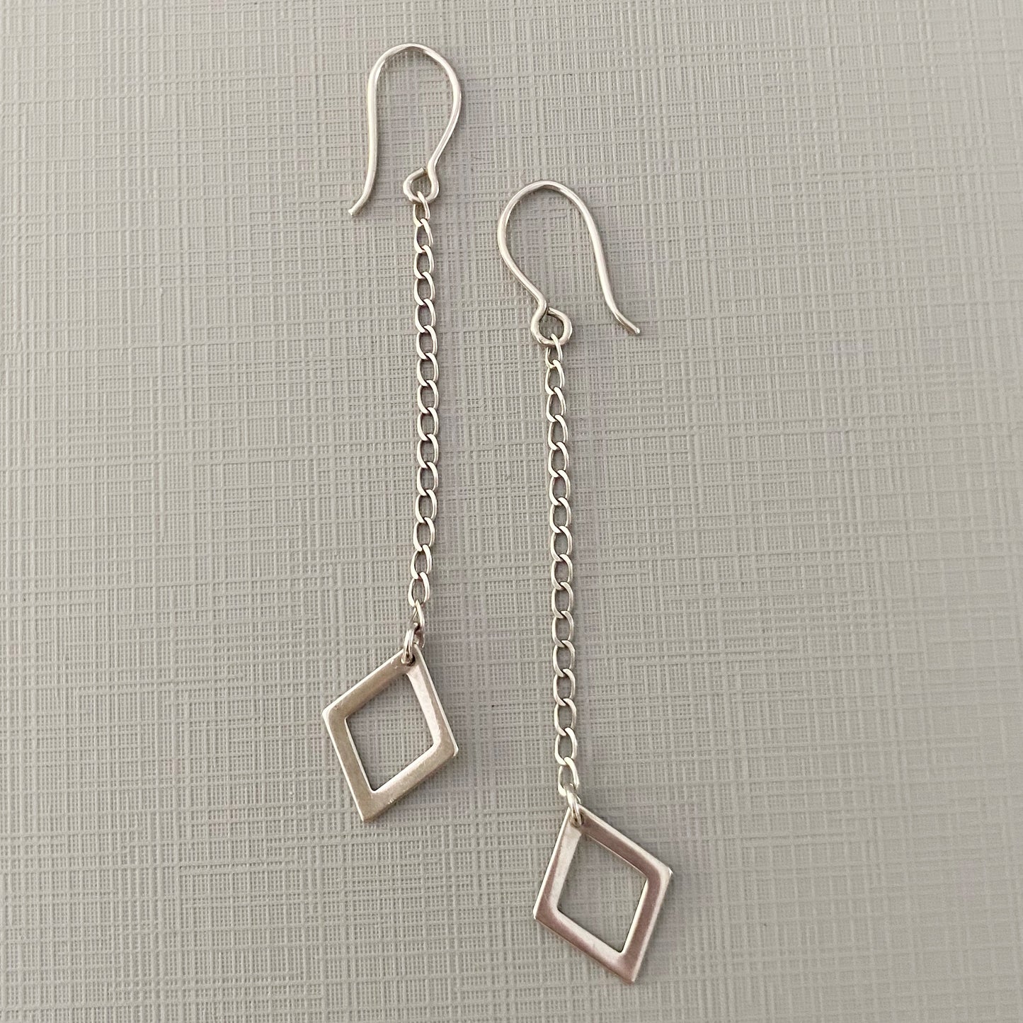 CHAIN AND SILVER DIAMOND earrings